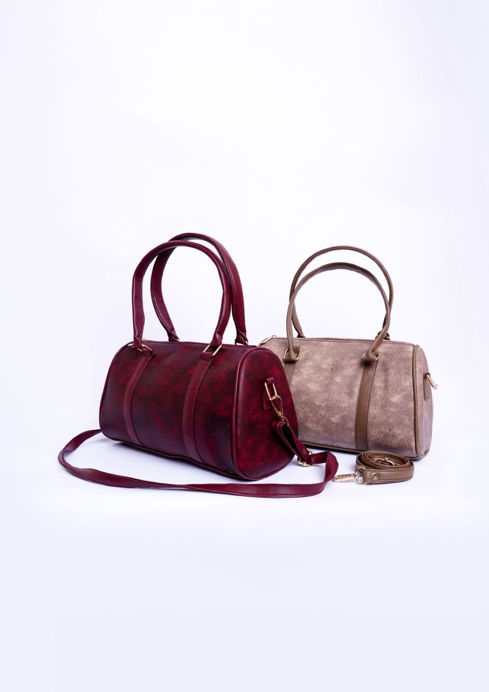Two unbranded leather handbags in burgundy and taupe photographed against a plain white background